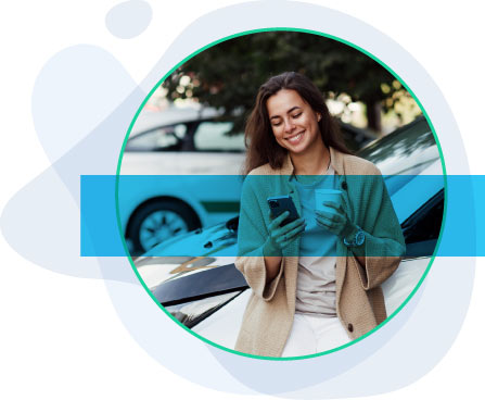 Smiling woman holding coffee and checking phone Smiling woman holding coffee and checking phone