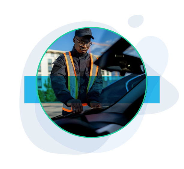 Officer issuing parking citation Officer issuing parking citation